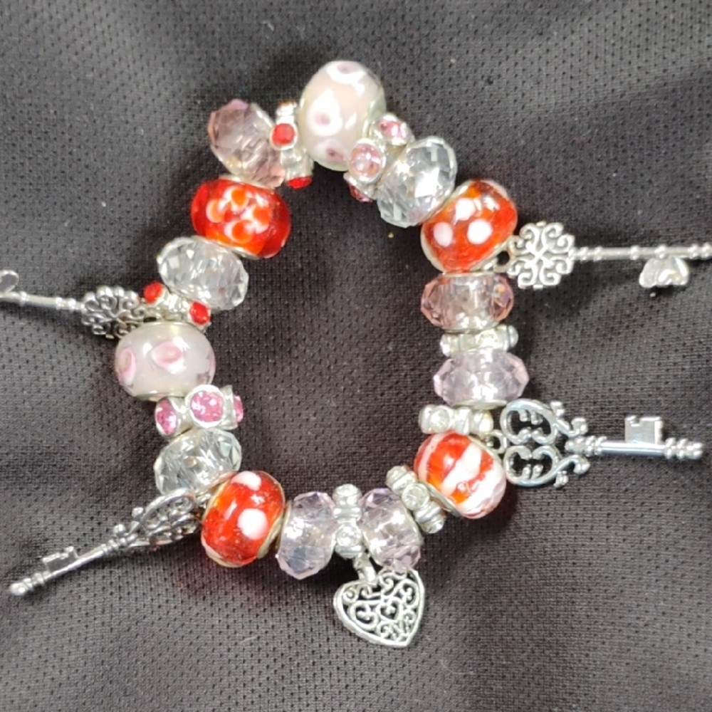 Elegant Silver and Red Charm Bracelet